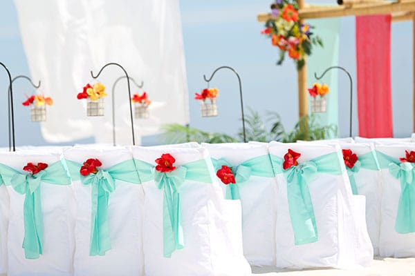 Plan Your Dream Beach Wedding in Orange Beach, Alabama Gulf Shores Beach Wedding Blue Sash with Red Flower Big Day Weddings